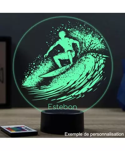 Lampe illusion 3D en verre acrylique gravée au laser représentant un surfeur.