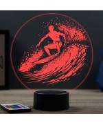 Lampe illusion 3D en verre acrylique gravée au laser représentant un surfeur.