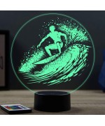 Lampe illusion 3D en verre acrylique gravée au laser représentant un surfeur.