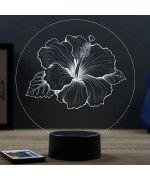 Lampe illusion 3D en verre acrylique gravée au laser représentant une fleur d'hibiscus.