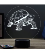 Lampe illusion 3D en verre acrylique gravée au laser représentant une tortue terrestre.
