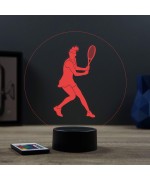 Lampe illusion 3D en verre acrylique gravée au laser représentant une joueuse de tennis à l'intérieur d'une balle de tennis.