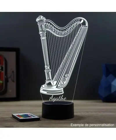 Lampe illusion 3D en verre acrylique gravée au laser représentant une harpe.