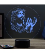 Lampe illusion 3D en verre acrylique gravée au laser représentant Jésus-Christ implorant.