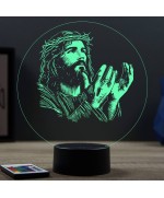 Lampe illusion 3D en verre acrylique gravée au laser représentant Jésus-Christ implorant.