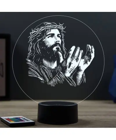 Lampe illusion 3D en verre acrylique gravée au laser représentant Jésus-Christ implorant.