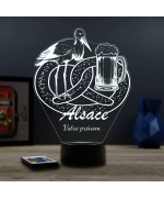 Lampe illusion 3D thème alsace avec bretzel, cigogne et bière.
