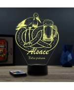 Lampe illusion 3D thème alsace avec bretzel, cigogne et bière.