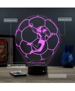 Lampe illusion 3D en verre acrylique gravée au laser représentant une joueuse de Handball à l'intérieur d'un ballon.