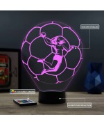 Lampe illusion 3D en verre acrylique gravée au laser représentant une joueuse de Handball à l'intérieur d'un ballon.