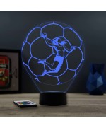 Lampe illusion 3D en verre acrylique gravée au laser représentant une joueuse de Handball à l'intérieur d'un ballon.