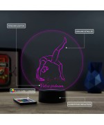 Lampe illusion 3D en verre acrylique gravée au laser représentant une gymnaste.