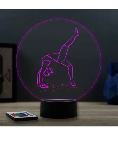 Lampe illusion 3D en verre acrylique gravée au laser représentant une gymnaste.