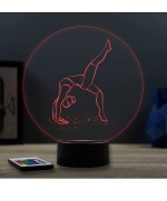 Lampe illusion 3D en verre acrylique gravée au laser représentant une gymnaste.