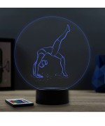 Lampe illusion 3D en verre acrylique gravée au laser représentant une gymnaste.