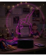 Lampe illusion 3D en verre acrylique gravée au laser représentant une gymnaste.