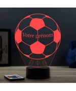 Lampe illusion 3D en verre acrylique gravée au laser représentant un ballon de foot avec le prénom du joueur.