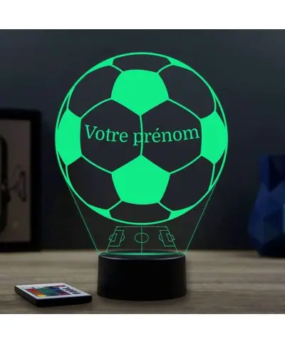 Lampe illusion 3D en verre acrylique gravée au laser représentant un ballon de foot avec le prénom du joueur.