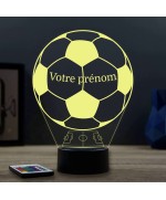 Lampe illusion 3D en verre acrylique gravée au laser représentant un ballon de foot avec le prénom du joueur.